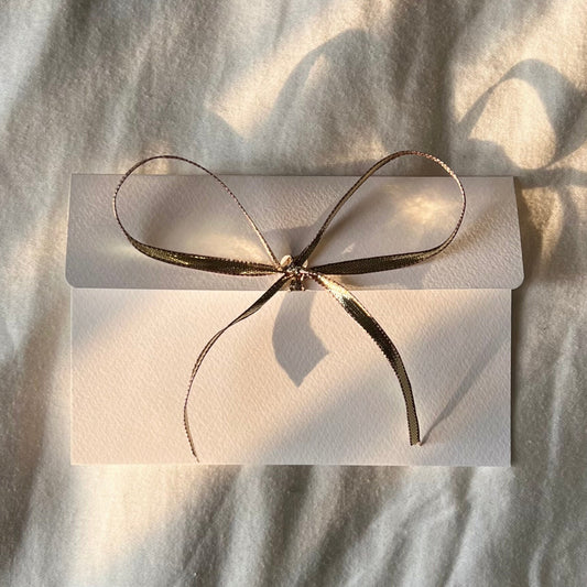 heart + ribbon envelope (gold satin)